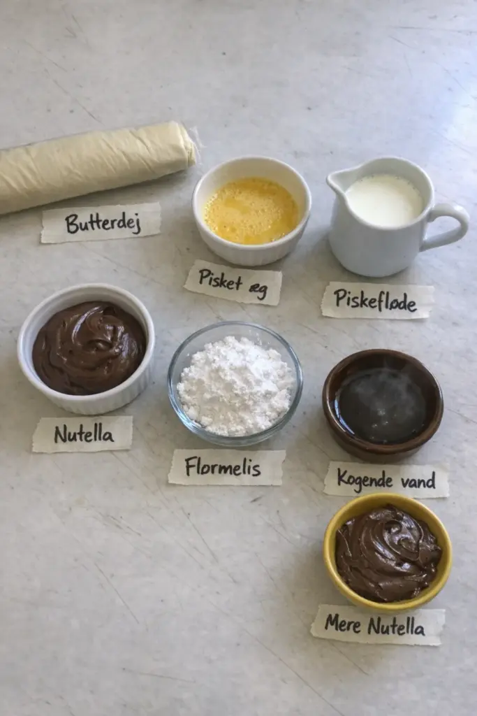 Fastelavnsboller med Nutella: sprøde butterdejsboller fyldt med chokoladeskum